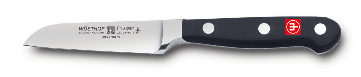 4000-7 wusthof classis flat cut paring knife. three inch. riveted handle.