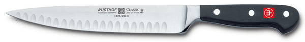 4524-7/20 wusthof classic 8 inch hollow edge carving knife. riveted handle.