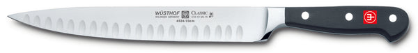 4524-7/23 wusthof classic 9 inch hollow edge carving knife. riveted handle.